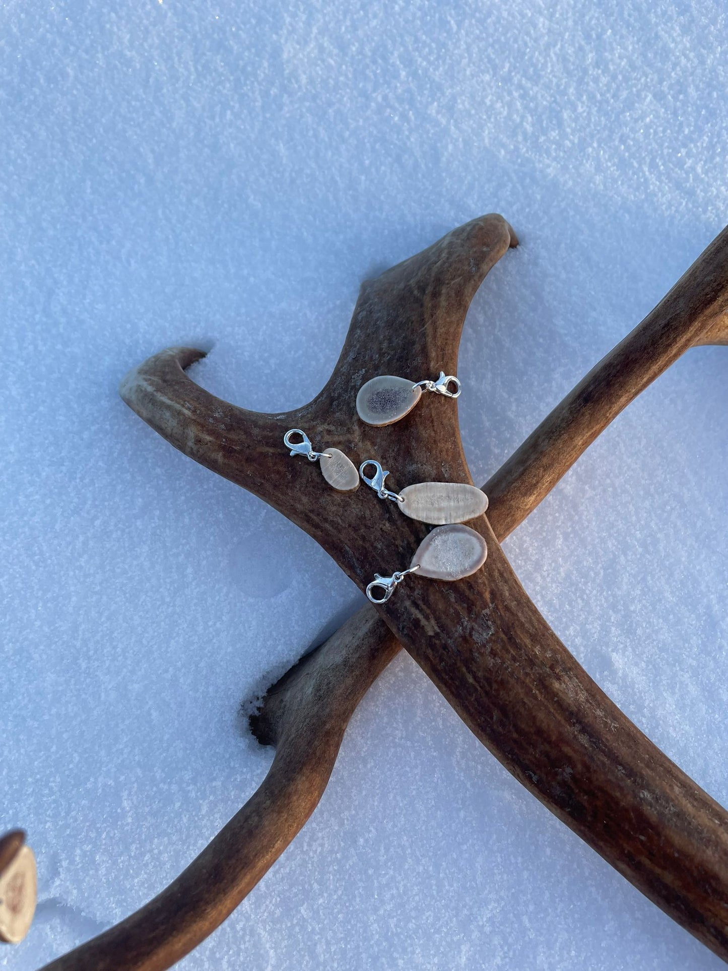 Silmukkamerkki, poronluu