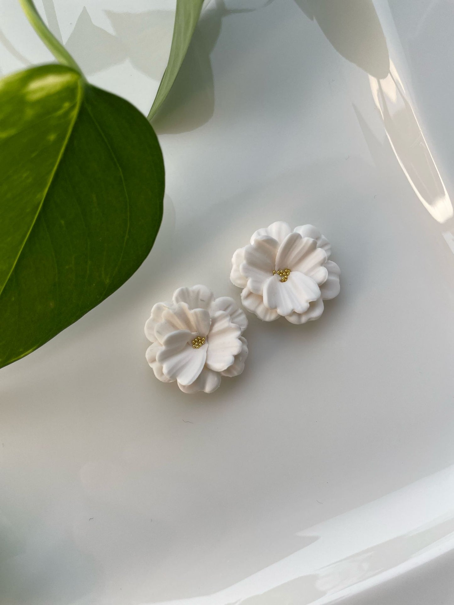 Elise-nappikorvakorut