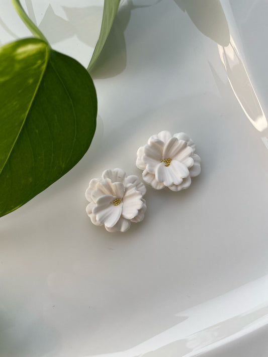 Elise-nappikorvakorut