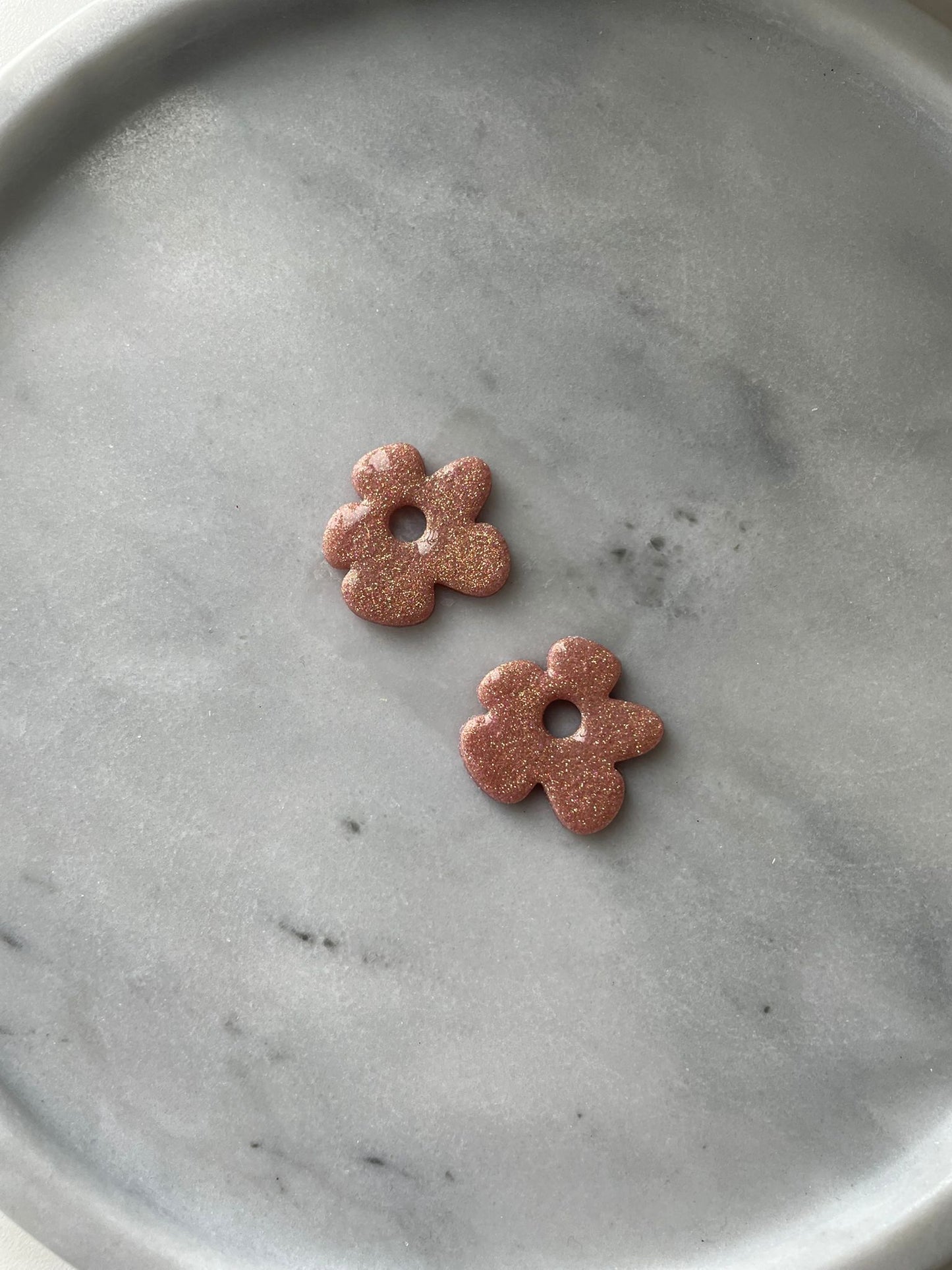 Kukat renkaissa- vaihtopari