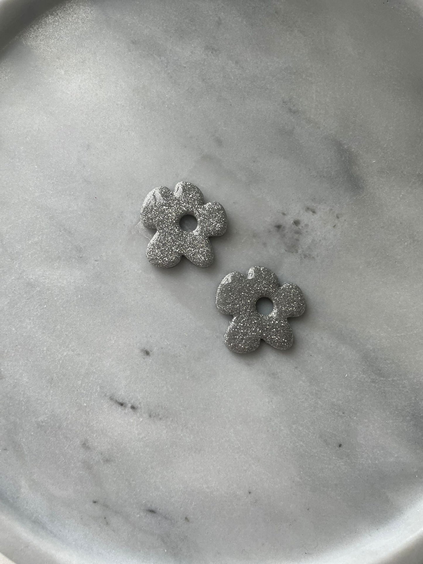 Kukat renkaissa- vaihtopari